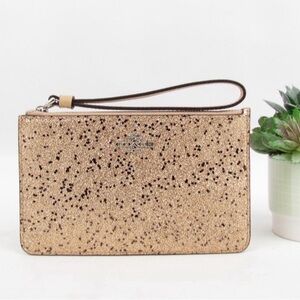 Coach NWT Star Gold Glitter Printed Coated Canvas Corner Zip Wristlet NWT